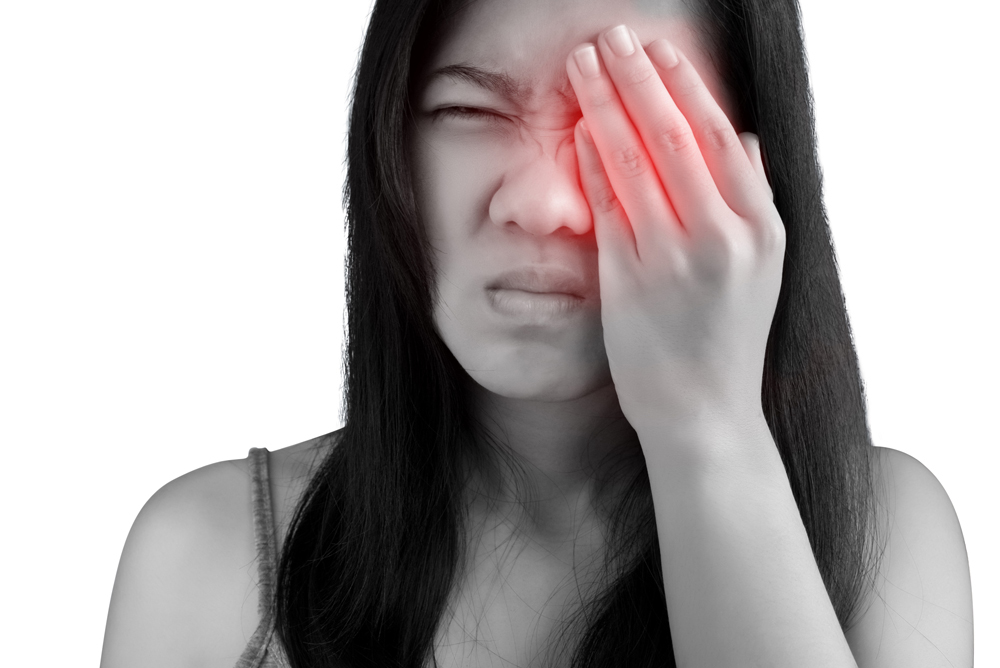 woman suffering from an eye injury
